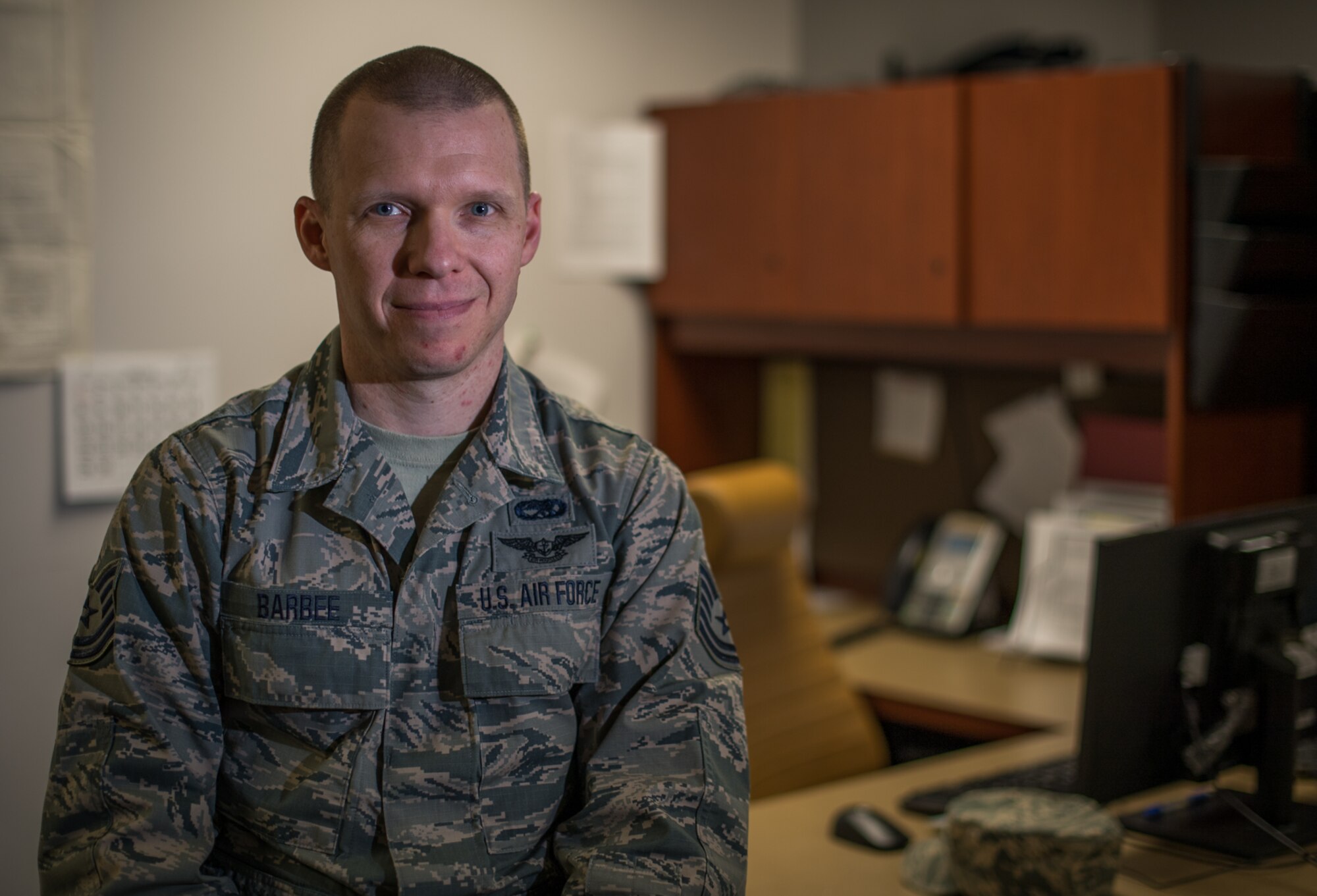 Tech. Sgt. Timothy Barbee shares his Airman's Story with 932nd Airlift Wing leadership during the monthly Wing Review.