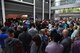 Visitors to the National Museum of the U.S. Air Force await the doors being opened for their chance to see and take part in the  Memphis Belle exhibit opening events May 17-19, 2018. (U.S. Air Force photo by Ken LaRock)