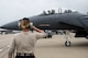 Col. Donn Yates, 48th Operations Group commander, returns a salute from a 48th Aircraft Maintenance Squadron Airman prior to his final flight at Royal Air Force Lakenheath, England, June 1. Yates is expected to take command of the 4th Fighter Wing at Seymour Johnson Air Force Base, North Carolina this summer. (U.S. Air Force photo/Senior Airman Malcolm Mayfield)