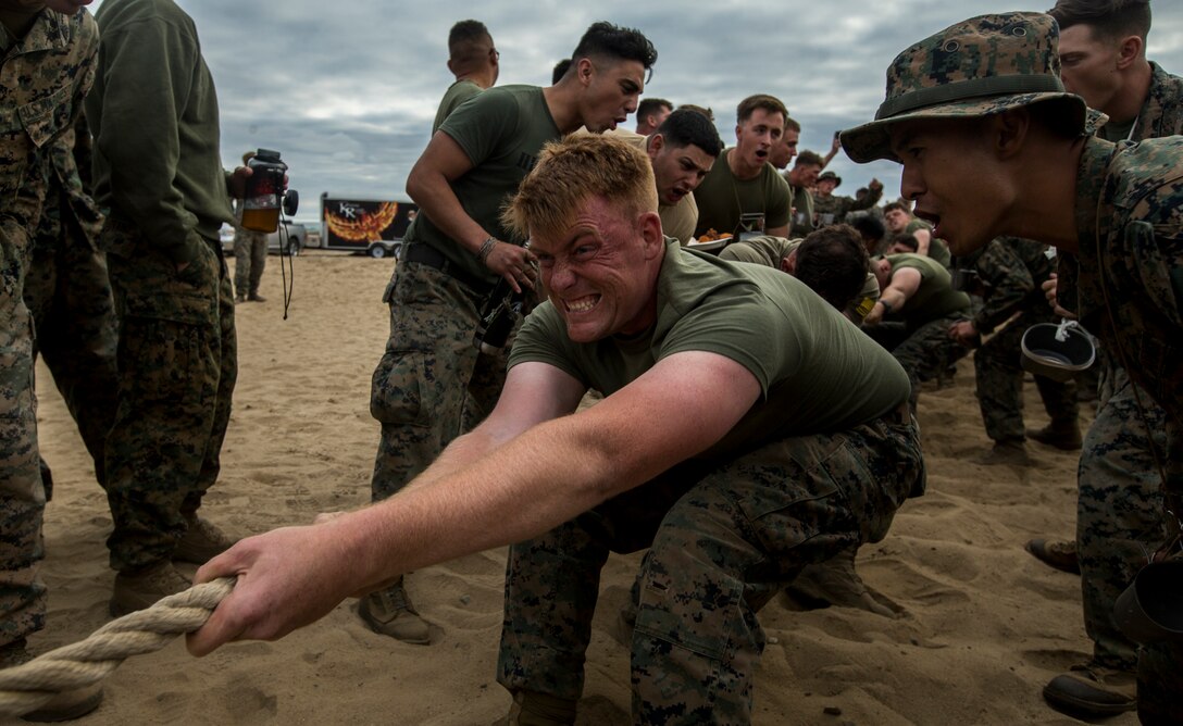 U.S. Marines, with 1st Light Armored Reconnaissance Battalion, 1st Marine Division, pull during the battalion’s Highlanders' Night tug-of-war competition at Marine Corps Base Camp Pendleton, Calif., May 24, 2018
