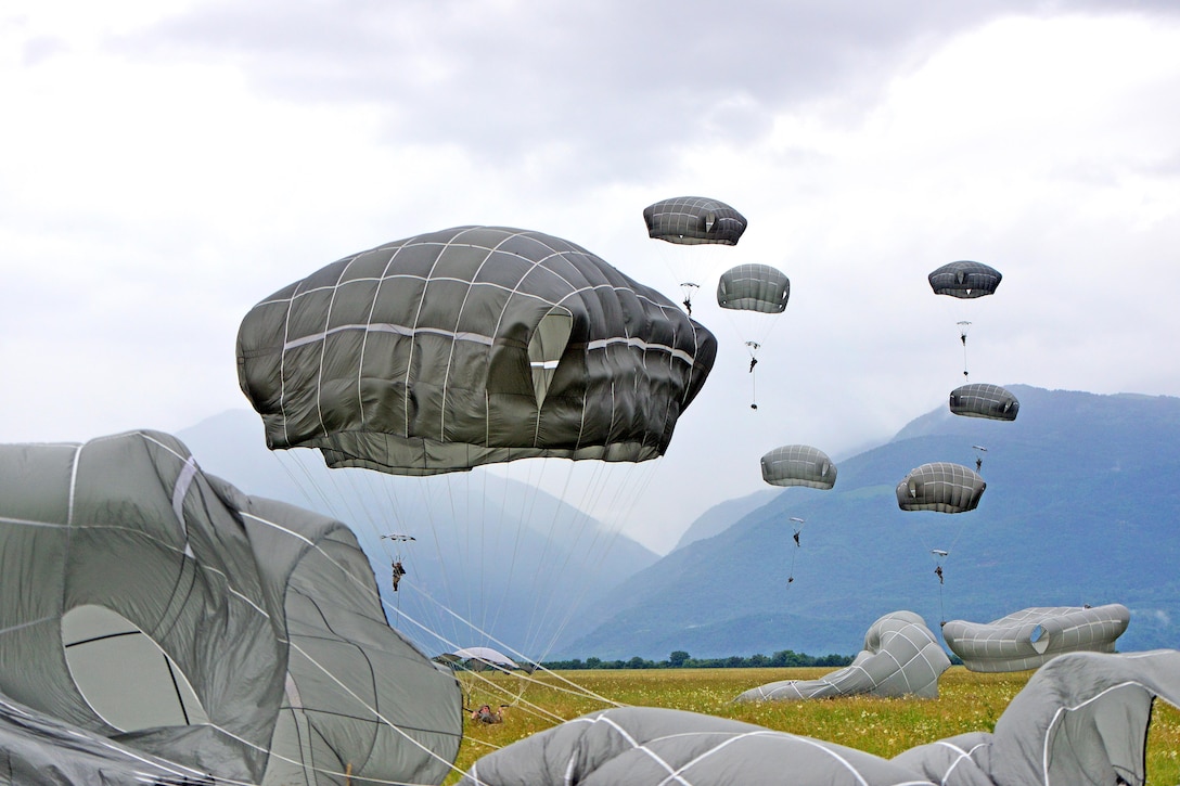 Soldiers descend to the ground during airborne operation.