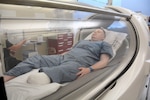 Army Capt. Kyle Salik was the first patient to receive oxygen therapy at the new Undersea & Hyperbaric Medicine Clinic at Brooke Army Medical Center June 20, 2017. Hyperbaric oxygen can be used to treat 14 different indicators including wound healing.