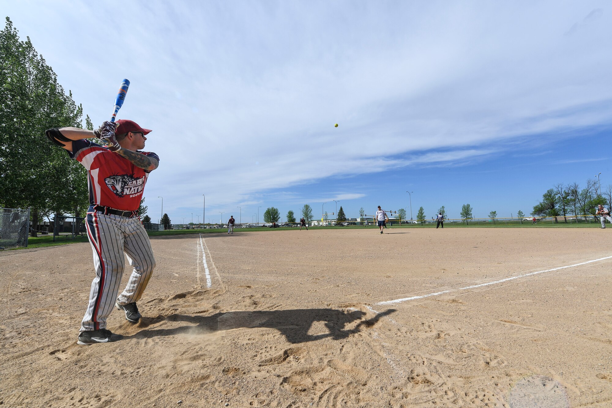 Team Minot faced-off against Team Grand Forks in the fourth annual Wingman Week softball tournament at Devils Lake, North Dakota, May 24, 2018.