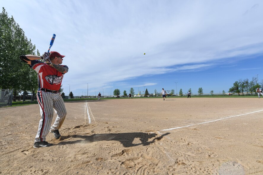 Team Minot faced-off against Team Grand Forks in the fourth annual Wingman Week softball tournament at Devils Lake, North Dakota, May 24, 2018.