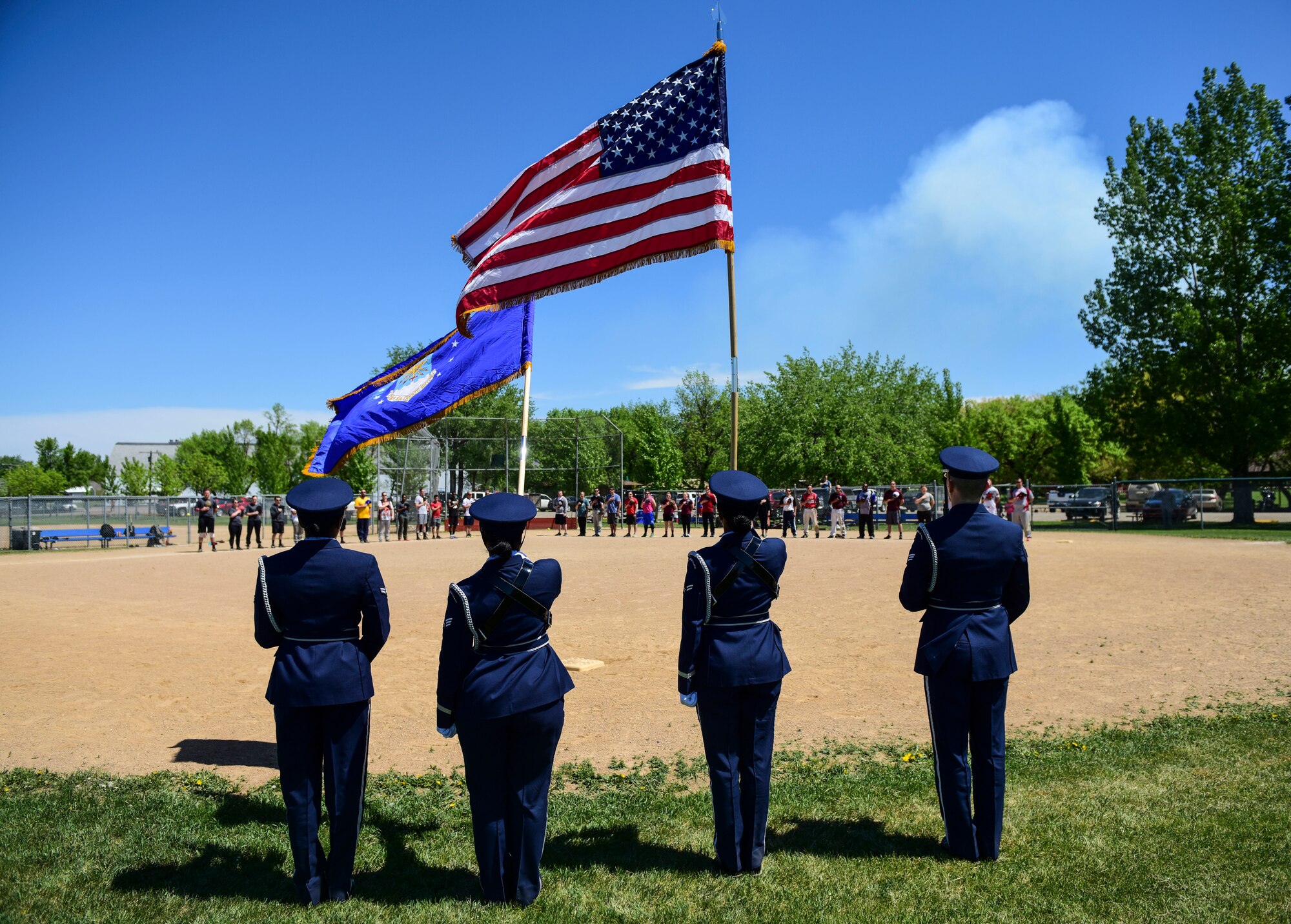 Team Minot faced-off against Team Grand Forks in the fourth annual Wingman Week softball tournament at Devils Lake, North Dakota, May 24, 2018.