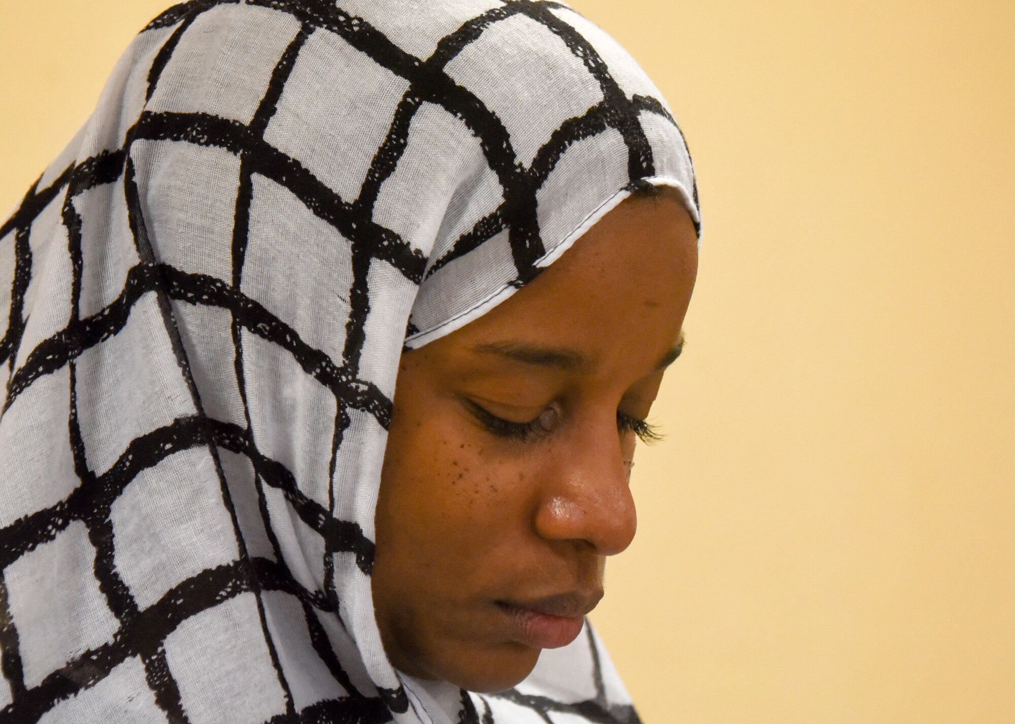 Chief Master Sgt. Gloria Weatherspoon, 379th Expeditionary Force Support Squadron superintendent, focuses on increasing prayer time in preparation for Ramadan, May 13, 2018, at Al Udeid Air Base, Qatar. After returning to her home station from this deployment, Weatherspoon will submit an official request to wear a hijab in uniform. (U.S. Air Force photo by Staff Sgt. Enjoli Saunders)