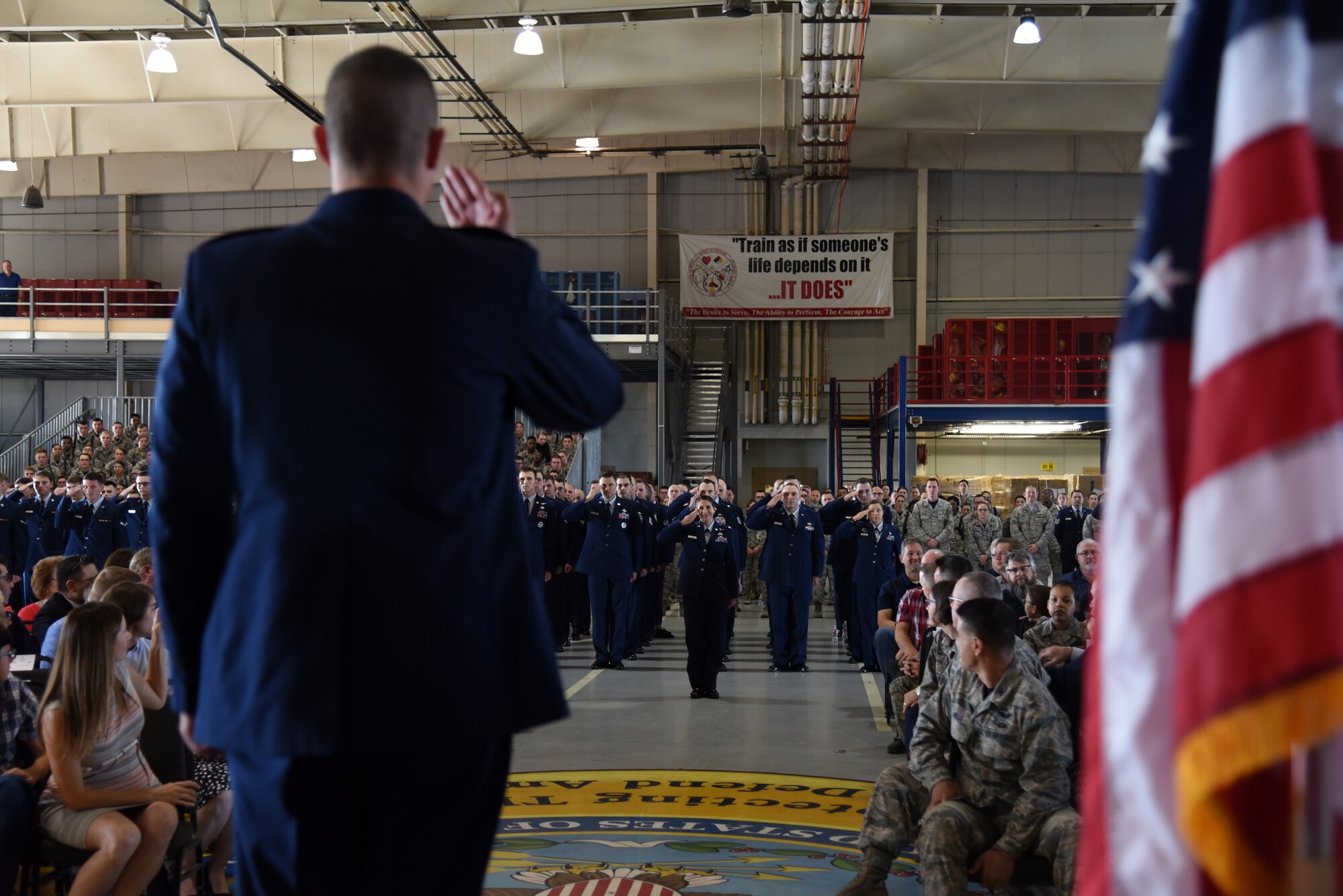 U.S. Air Force Lt. Col. Kenneth Stremmel, 315th Training Squadron outgoing commander, performs his final salute to his squadron during the 315th TRS Change of Command at the Louis F. Garland Department of Defense Fire Academy High Bay on Goodfellow Air Force Base, Texas, June 1, 2018. The change of command ceremony is a time honored military tradition that signifies the orderly transfer of authority. (U.S. Air Force photo by Staff Sgt. Joshua Edwards/Released