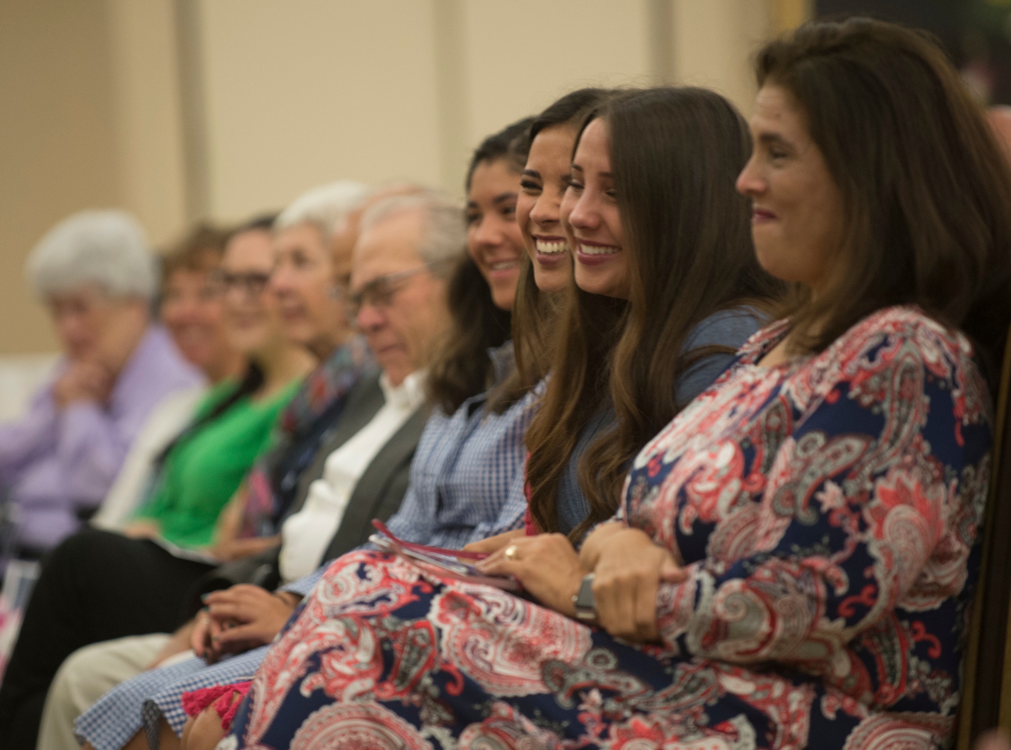 Brig. Gen. Mitchel Butikofer’s, Air Forces Cyber vice commander, family share laughs during Butikofer’s retirement ceremony at Joint Base San Antonio-Lackland, Texas, June 1, 2018. Butikofer retired after 29 years of service. (U.S. Air Force photo by Tech. Sgt. R.J. Biermann)