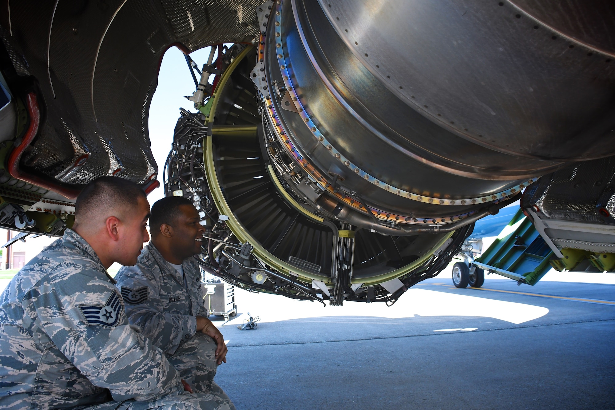 Tech. Sgt. Kenis Wallace, 932nd Maintenance Group C-40 Maintenance Instructor,  provides an open area of the engine to examine for a visitor May 8, 2018, at Scott Air Force Base, Ill.  According to Wallace, "Here at the 932nd Maintenance Group, we provide maintenance training for all of the units that fly the C-40, including active, guard and reserve."  

This time around the 932nd Airlift Wing had five flying crew chiefs from the 15th AMXS at Hickam Air Force Base, and four from the 89th MXG located at Andrews Air Force Base.

"What we were doing was our Flying Crew Chief specialty course, during which we spend two weeks providing advanced training for Active Duty Flying Crew Chiefs. We provide training on scenarios and troubleshooting that may happen when they're out with an aircraft on the road (traveling)," said Wallace.  While a recent FOD (foreign object damage) walk was going on, 932nd MXG members were training their visiting guests on opening engine fan cowls and thrust reversers. 

"With the engines opened we trained component location and identification on the core of the engine," said Wallace.

He pays attention to detail every day in all conditions, no matter if it is the coldest day in the winter, or hottest day in summer, and enjoys his work at Scott Air Force Base.  "As far as what I love about my job, it is the people.  Maintainers work hard and play hard even when its hot and 100 degrees out and everyone is trying to get the job done, at the end of the day everyone is like your family and you can always have a laugh," Wallace added.

(U.S. Air Force photo by Lt. Col. Stan Paregien)