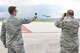 Tech. Sgt. Brandon Williams, the 28th Operations Support Squadron noncommissioned of in charge of airfield weather operations and Master Sgt. William Price 28th OSS Weather Flight chief, use a device that measures wind speed and binoculars to look for approaching weather conditions at Ellsworth Air Force Base, S.D., May 29, 2018. The weather flight helps leaders on base determine the best times to fly are to avoid any complications that could be harmful to aircrew members. (U.S. Air Force photo by Airman 1st Class Thomas Karol)