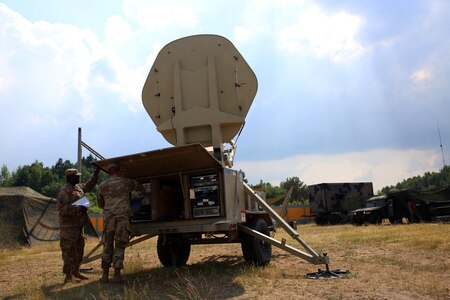 Soldiers at satellite dish