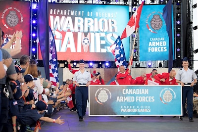 Team Canada officially enters its first DoD Warrior Games during opening ceremonies for the 2018 games at the U.S. Air Force Academy in Colorado Springs, Colo., June 2, 2018. DoD photo by EJ Hersom