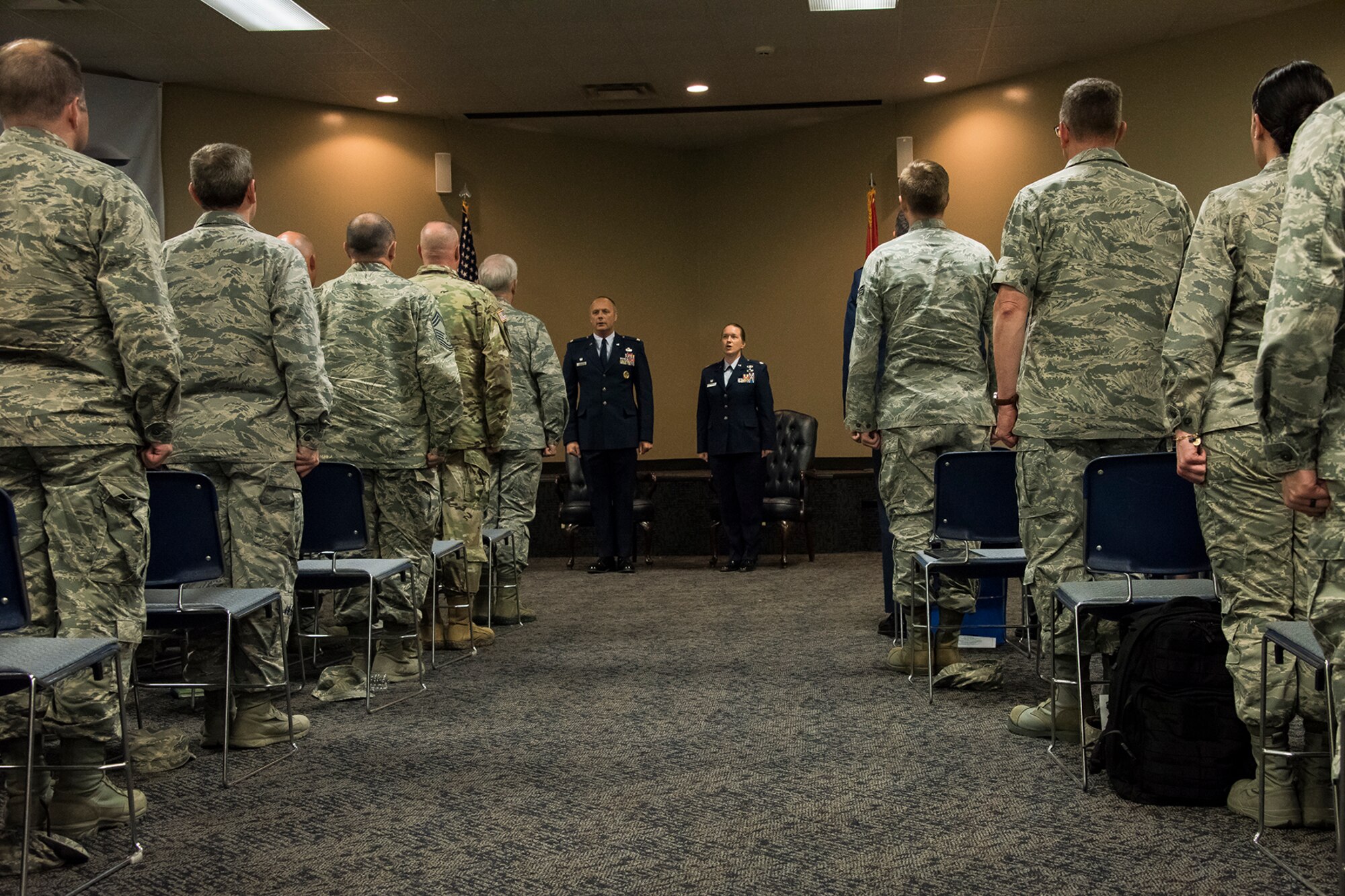 Col. Robert I. Kinney, 188th Wing commander, and Lt. Col. Sara A. Stigler, 188 ISR Group commander, lead a rendition of the Air Force Song during an Assumption of Command ceremony held June 2, 2018 at Ebbing Air National Guard Base, Arkansas. Stigler, a career intelligence officer, assumed command of the 188th Intelligence, Surveillance and Reconnaissance Group. (U.S. Air National Guard photo by Tech. Sgt. John E. Hillier)