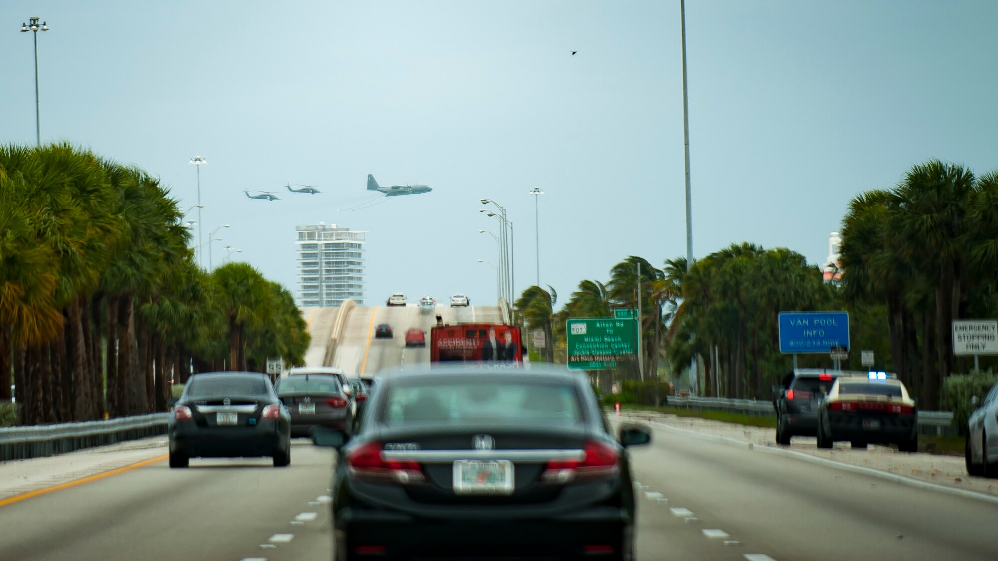 Air Force Reserve Citizen Airmen from the 920th Rescue Wing out of Patrick Air Force Base in Cocoa Beach, Florida fly past Miami Beach aboard an HC-130P/N King airplane and two HH-60G Pave Hawk helicopters on May 27th, 2018 during the 2nd annual Salute to American Heroes Air and Sea Show. This two-day event showcases military fighter jets and other aircraft and equipment from all branches of the United States military in observance of Memorial Day, honoring servicemembers who have made the ultimate sacrifice. (U.S. Air Force photo/Staff Sgt. Jared Trimarchi)