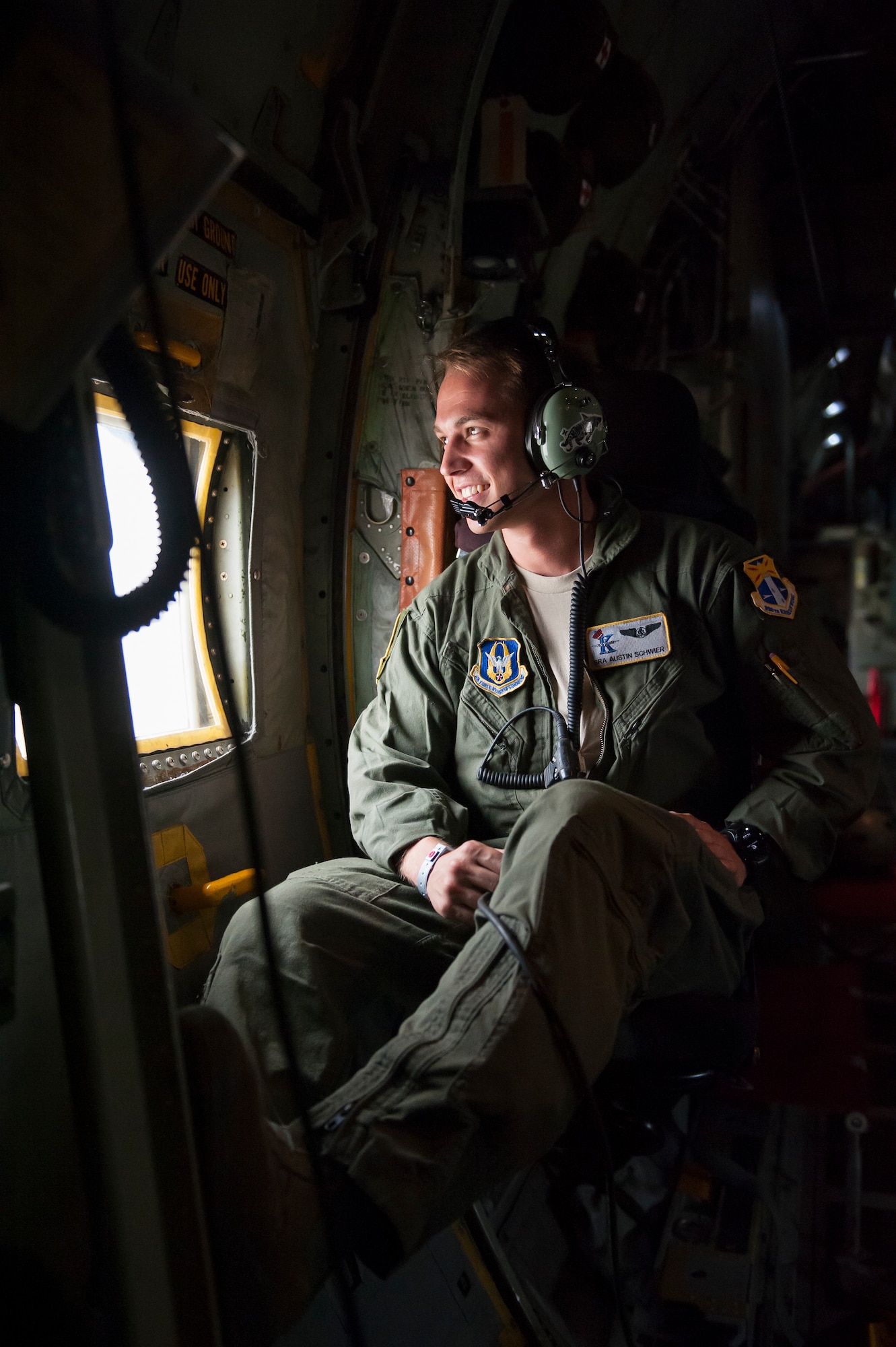 Air Force Reserve Senior Airman Austin Schwier, with the 39th Rescue Squadron out of Patrick Air Force Base in Cocoa Beach, Florida, waits for the rain to clear aboard an HC-130- P/N “King” on May 25th, 2018, at Miami, before a practice run for the 2nd annual Salute to American Heroes Air and Sea Show. This two-day event showcases military fighter jets and other aircraft and equipment from all branches of the United States military in observance of Memorial Day, honoring servicemembers who have made the ultimate sacrifice. (U.S. Air Force photo/Staff Sgt. Jared Trimarchi)