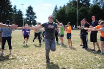U.S. Airmen with the 446th Aeromedical Evacuation Squadron cheer as AES Citizen Airmen complete the first ever 446th AES amazing race morale event, June 2, 2018 at Joint Base Lewis-McChord Wash. (U.S. Air Force photo by Master Sgt. Minnette Mason)