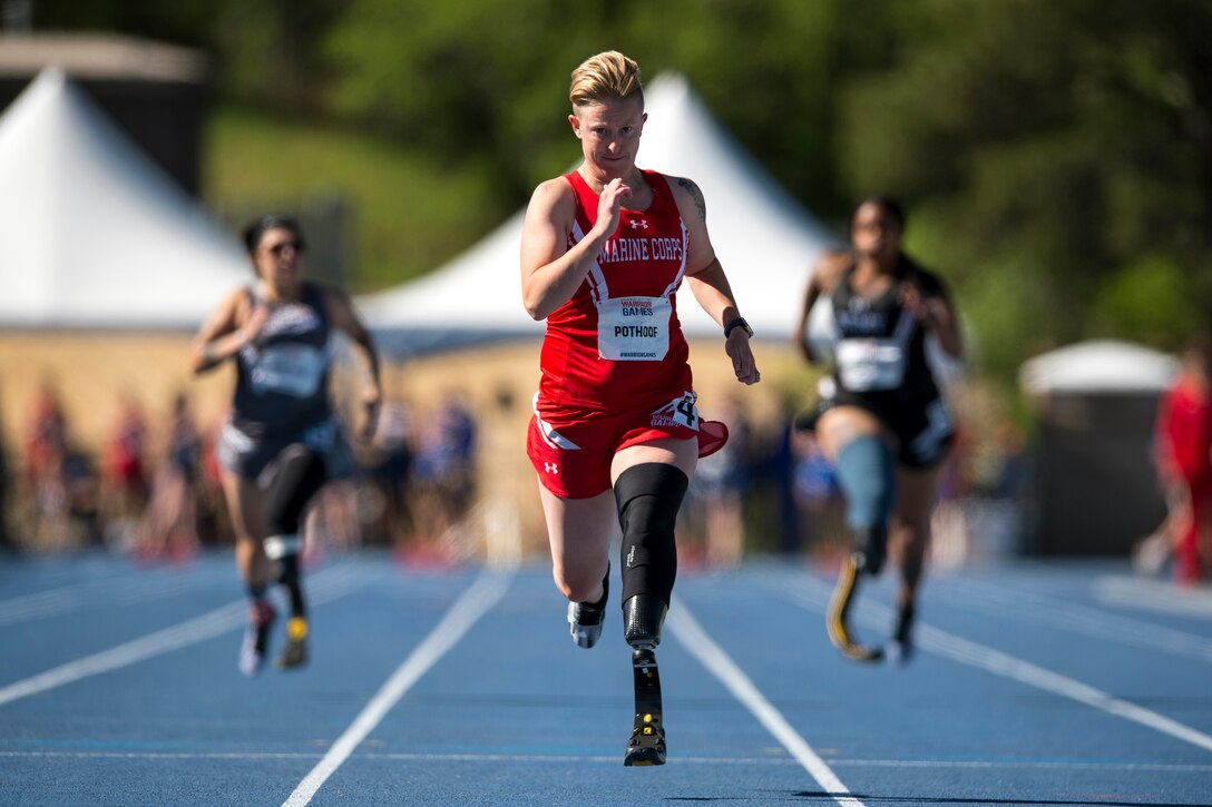 A veteran competes in the 100-meter dash during the 2018 Defense Department Warrior Games.