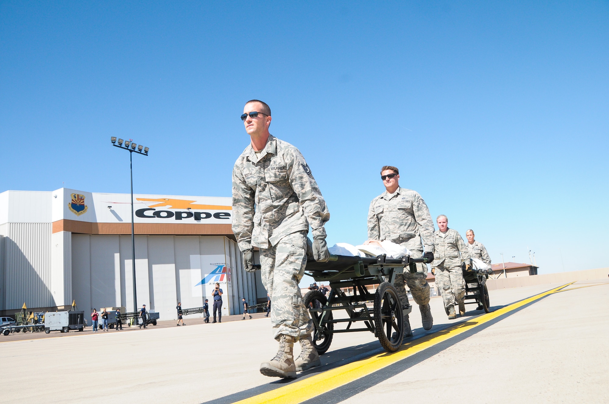 Reserve Citizen Airmen from the 944th Aeromedical Staging Squadron transport simulated patients during a National Disaster Medical System exercise May 22 at Phoenix Sky Harbor.