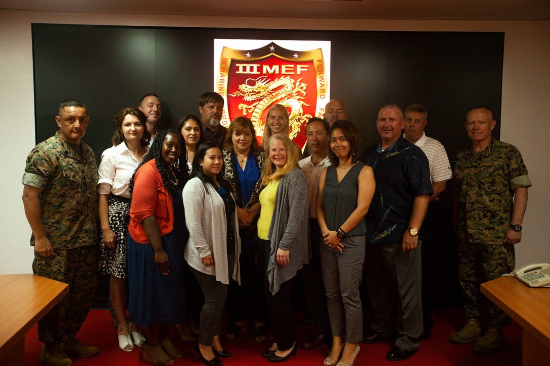 Lt. Gen. Lawrence D. Nicholson, the III Marine Expeditionary Force commanding general, shows his appreciation to family readiness officers, May 39, 2018, at Camp Courtney, Okinawa, Japan. Family readiness officers dedicate their time to helping Marines and their families prepare for deployments. (U.S. Marine photo by Lance Cpl. Zackary Walker)