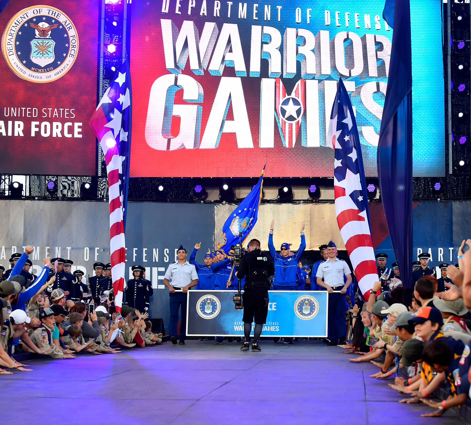 Team Air Force walks down the ramp during the opening ceremony of the Department of Defense Warrior Games at the U.S. Air Force Academy in Colorado Springs, Colorado, June 2, 2018. There are 39 athletes representing Team Air Force at the Games, competing against wounded, ill and injured service members and veterans representing the U.S. Army, Marine Corps, Navy, and Special Operations Command, as well as athletes from the United Kingdom Armed Forces, Australian Defence Force and Canadian Armed Forces. (U.S. Air Force photo by Staff Sgt. Rusty Frank)