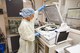 U.S. Air Force Tech. Sgt. Rebecca Torres, a biomedical equipment technician from the 944th Aeromedical Staging Squadron at Luke Air Force Base, Arizona, opens a sterilization machine in the central sterile room at Maniilaq Health Center, in Kotzebue, Alaska, in support of Arctic Care 2018, April 18, 2018. Torres ensured that medical equipment used for surgeries and biopsies are sterile and prepped for use. (U.S. Air Force photo by 1st Lt. Rashard Coaxum)