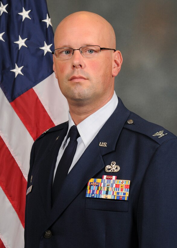 Col. Travis Caughlin, 507th Maintenance Group commander, stands for an official photograph at Tinker Air Force Base, Oklahoma. (U.S. Air Force photo)