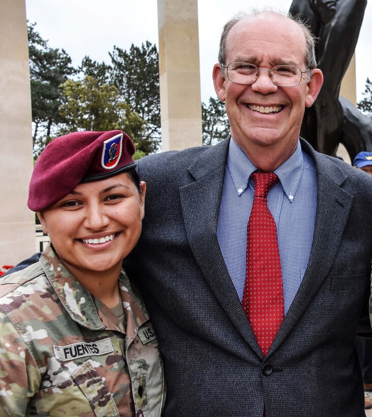 A soldier shares a moment and smiles with David Eisenhower, grandson of the late Army general and 34th U.S. president Dwight D. Eisenhower.
