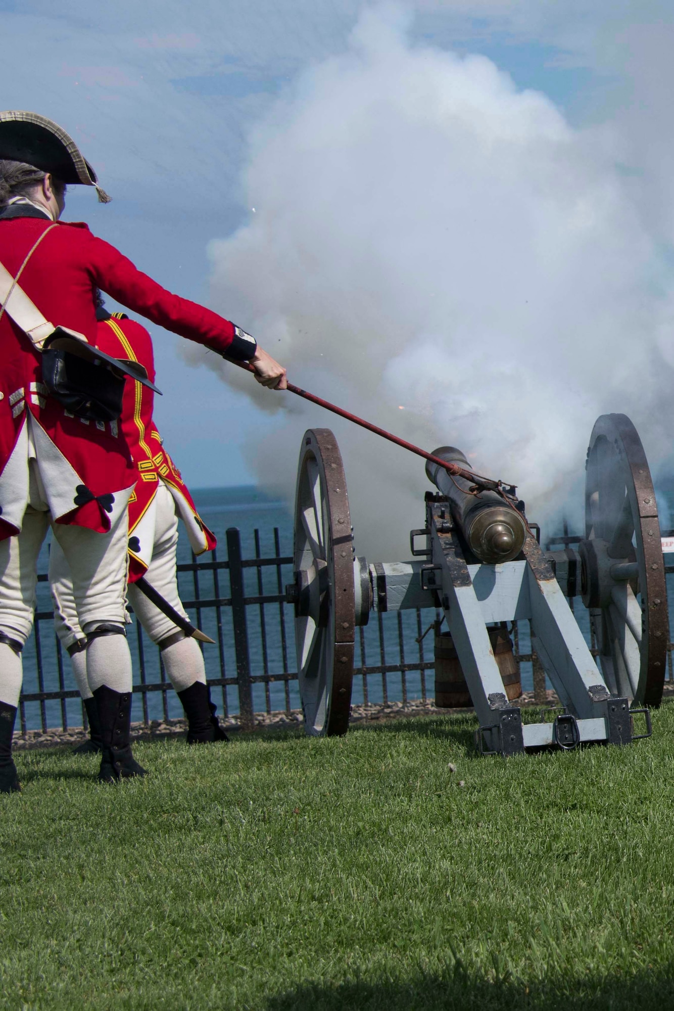 Re-enactors fire a cannon during a demonstration at Fort Niagara, New York, May 31, 2018.  Civilian leaders from the Greater Shreveport/Bossier City area visited the national historic site as part of a Civic Leader Tour hosted by the Niagara Falls Air Reserve Station.  These tours allow leaders from other areas of the country to learn more about the mission of other military units and their historical traditions.  During this tour, the Louisiana contingent learned about the capabilities and mission of the 914th Air Refueling Wing, the 107th Attack Wing, the Niagara Falls Military Entrance Processing Station and the U.S. Coast Guard Buffalo Sector.  (U.S. Air Force photo by Master Sgt. Ted Daigle/released)