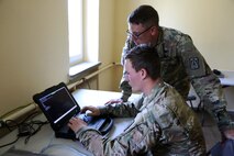 Soldiers at computer