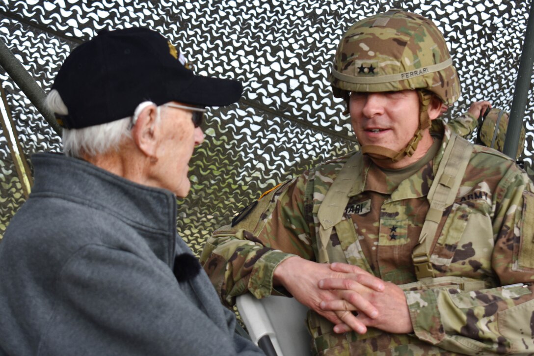 A WWII veteran talks to a commander.