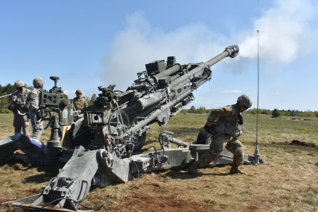 Soldiers fire an M777 howitzer during a live-fire mission.