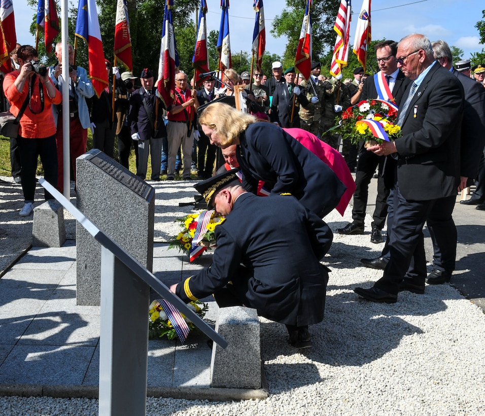 U.S. Army Europe Commanding General Lt. Gen. Christopher Cavoli, Susan Eisenhower, and community leaders lay wreaths at the base of the Eisenhower Monument in Tournieres, France.