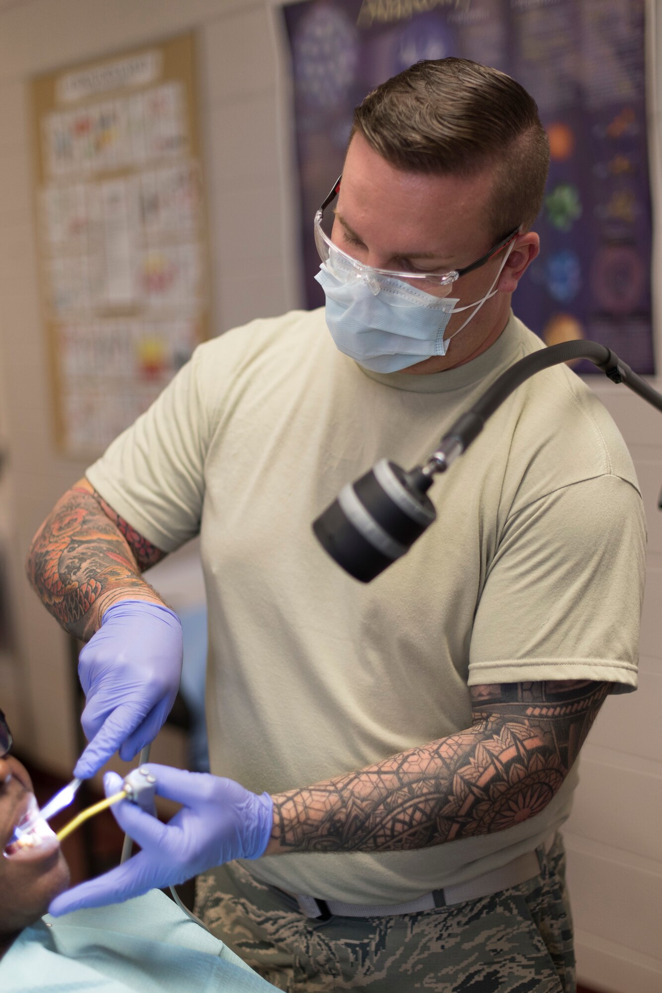 Staff Sgt. Reagin, an Air National Guard medic from the 187th Fighter Wing CERFP in Montgomery, Ala., performs dental work during the Alabama Wellness Innovative Readiness Training (IRT) June 2, 2018 at Thomasville High School in Thomasville, Ala. Air Guardsmen from Alabama and Wisconsin were part of the joint force participating in the two-week training that provided no-cost health care to the citizens of lower Alabama. (US Air National Guard photo by Staff Sgt. Jared Rand).