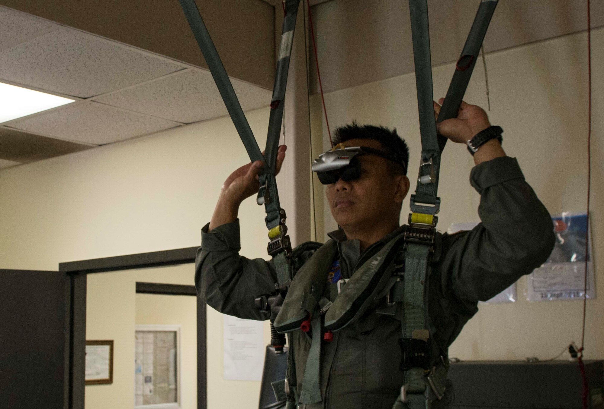 A member of the Philippine Air Force hangs in a harness at Shaw Air Force Base, S.C., May 22, 2018.
