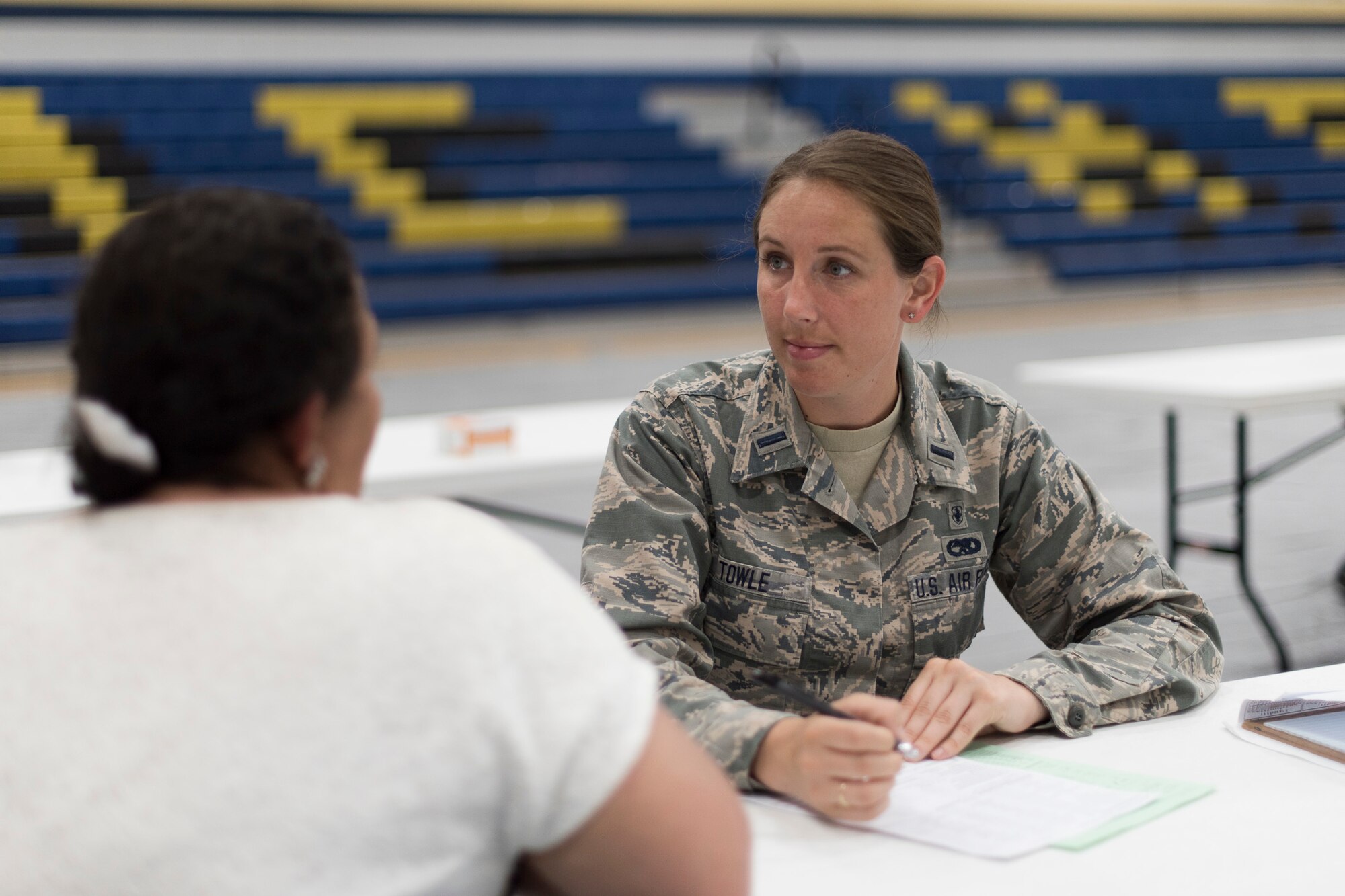 1st. Lt. Annie Towle, an Air National Guard clinical nurse from the 187th Fighter Wing CERFP in Montgomery, Ala., provides a patient health care screening June 3, 2018 at the Alabama Wellness Innovative Readiness Training at Monroe County High School in Monroeville, Ala. Air Guardsmen from Alabama and Wisconsin were part of the joint force participating in the two-week training that provided no-cost health care to the citizens of lower Alabama. (US Air National Guard photo by Staff Sgt. Jared Rand).