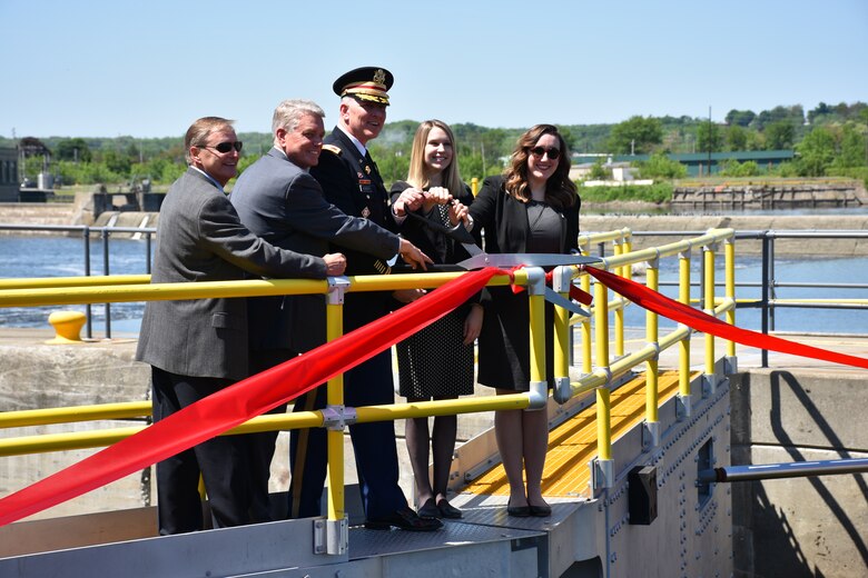 Col. Thomas D. Asbery, commander, USACE, New York District, along with elected official representatives cut the ribbon to commemorate the completed maintenance work for Troy Lock and Dam.