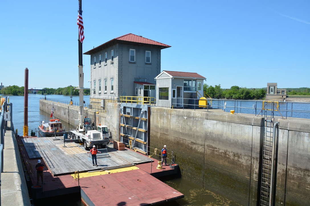 U.S. Army Corps of Engineers, New York District, working barge enters the Troy Lock and Dam from the south end of the Hudson River traveling north, during the ribbon cutting ceremony May 24, 2018.