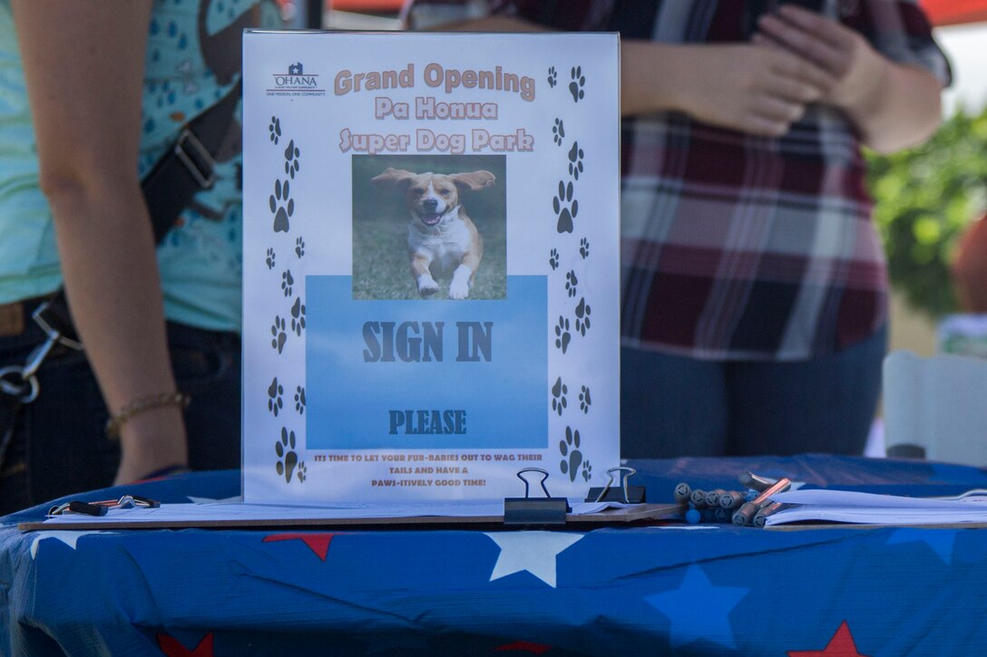 Guests prepare to sign in to the new Pa Honua Dog Park, Marine Corps Base Hawaii, May 23, 2018. Pa Honua is a new park for dogs to exercise and socialize in a central area. (U.S. Marine Corps photo by Lance Cpl. Matthew Kirk)