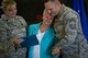 Lt. Col. Laura Holcomb, Calhoun’s former commander, presents his mother, Mildred, an award during Chief Master Sgt. Jim Calhoun ‘s retirement ceremony, June 1, 2017, at Moody Air Force Base, Ga. Calhoun entered the Air Force in August of 1991 and served in numerous positions within fuels management and logistics readiness throughout his career. (U.S. Air Force photo by Senior Airman Daniel Snider)