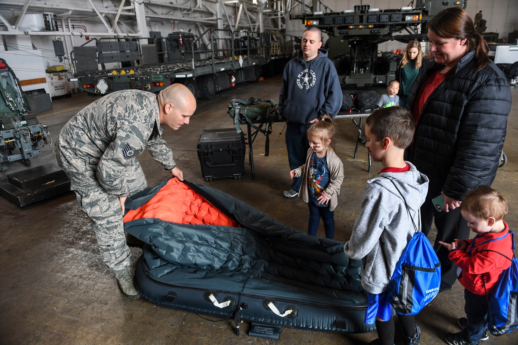 Operation Heroes is an annual event that allows children to experience a pre-departure briefing and demonstrations from more than 10 different units around base. During the event, children tasted Meals Ready-to-Eat, got their faces painted, saw Explosive Ordnance Disposal demonstrations and weapons displays.