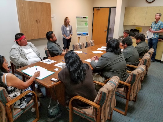 Travis Bone (right), archeologist for the U.S. Army Corps of Engineers Los Angeles District speaks with a delegation from the Colorado River Indian Tribes May 31. The Corps hosted scoping meetings to solicit stakeholder and public comment on changes to the Alamo Dam Water Control Plan.