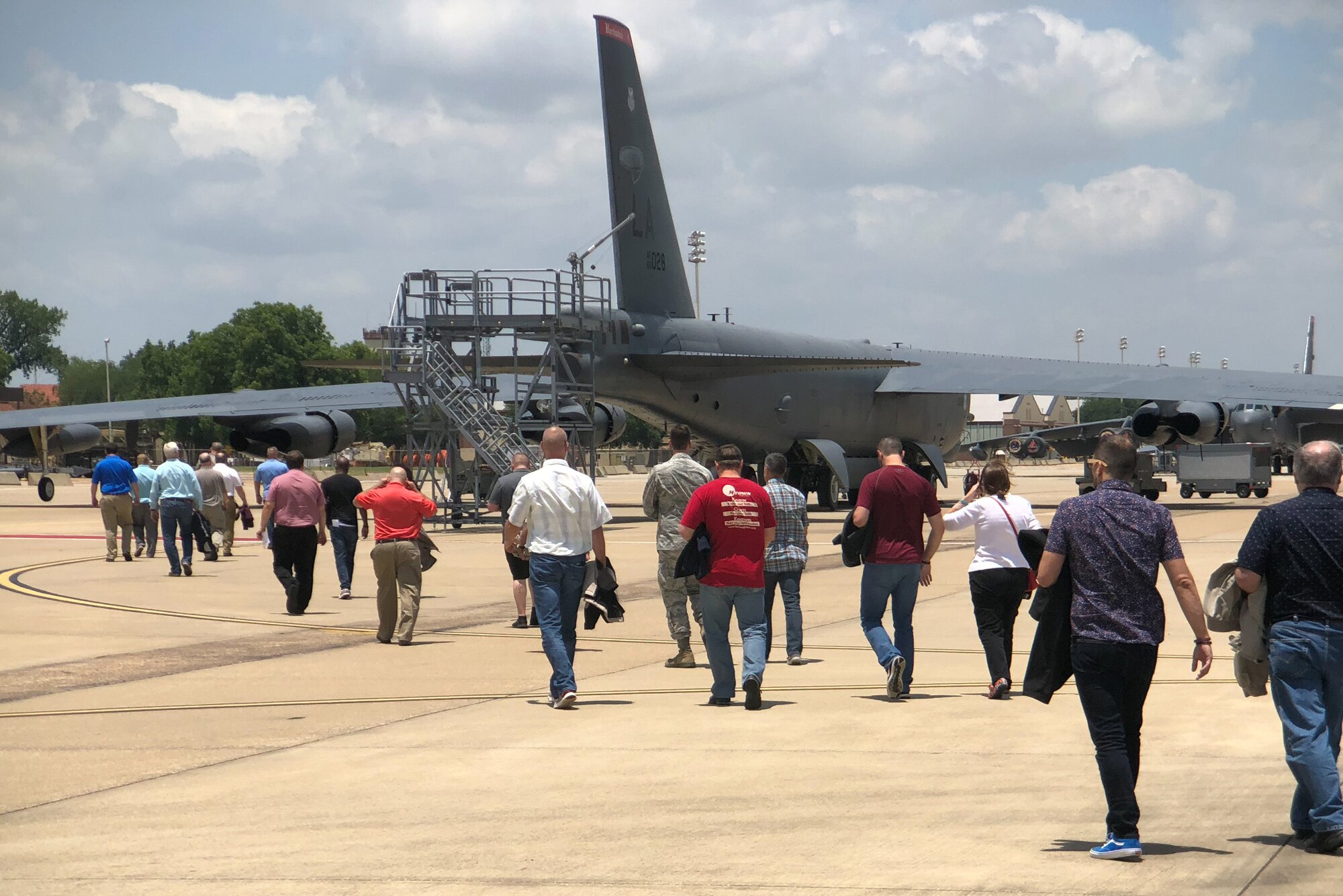 Clergy members make their way out to the flight line for a tour of a B-52 Stratofortress at Barksdale Air Force Base, Louisiana, June 1, 2018.  The tour was part of Clergy Appreciation Day in which Reserve Citizen Airmen of the 307th BW invited their clergy to learn more about the unit and watch an air refueling of the B-52 from a KC-135 Stratotanker. (U.S. Air Force photo by Tech. Sgt. Cody Burt/released)