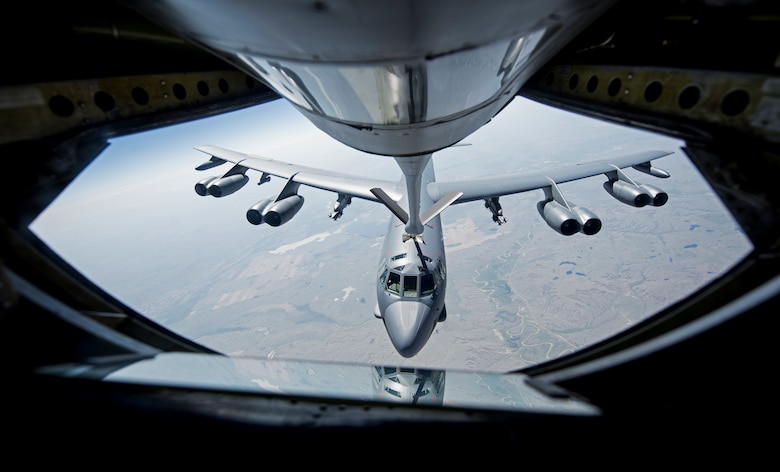 A KC-135 Stratotanker from the 92nd Air Refueling Wing at Fairchild Air Force Base, Wash. refuels B-52 Stratofortress. The refueling operation took place during Col. Ryan Samuelson, 92nd ARW/CC's final flight (U.S. Air Force photo/Senior Airman Sean Campbell)