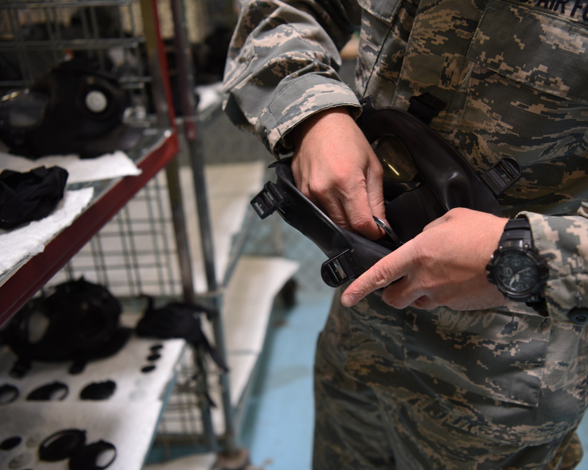 Senior Airman Tyler Marshall, 56th Logistics Readiness Squadron Individual Protection Equipment journeyman, assembles a gas mask June 4, 2018 at Luke Air Force Base, Ariz.