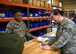 Airman 1st Class Jasmyn Marshall, 56th Logistics Readiness Squadron Individual Protection Equipment journeyman, rehearses a deployment equipment distribution scenario with Staff Sgt. Hannah Hendry, 56th LRS IPE supervisor, June 4, 2018 at Luke Air Force Base, Ariz.