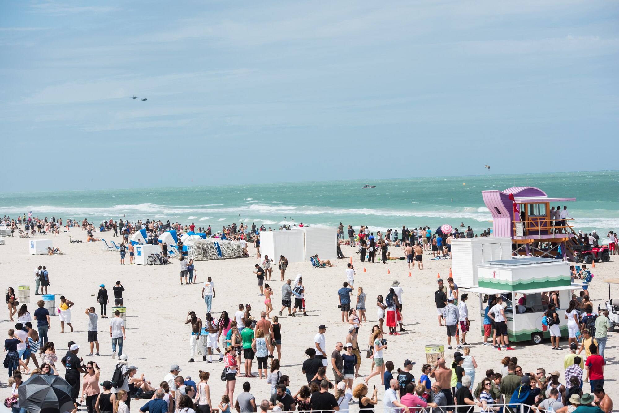 An F-35A Lightning II and F-16 Fighting Falcon fly over a crowd of air show guests during the 2018 Hyundai Air and Sea show at Miami Beach, Fla., May 27, 2018. The two-day show was held to pay tribute to military service members and first responders and honor those who have paid the ultimate sacrifice for our freedoms. (U.S. Air Force photo by Airman 1st Class Alexander Cook)