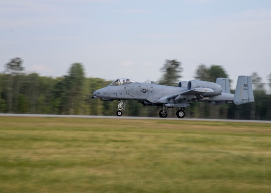 Two A-10 Thunderbolt II aircrafts sit on the flight line at Lielvarde Air Base, Latvia, June 4, 2018. The A-10s were deployed to Europe from the 127th Wing at Selfridge Air National Guard Base, Michigan, to support exercise Saber Strike 18. (U.S. Air Force photo by Staff Sgt. Jimmie D. Pike)