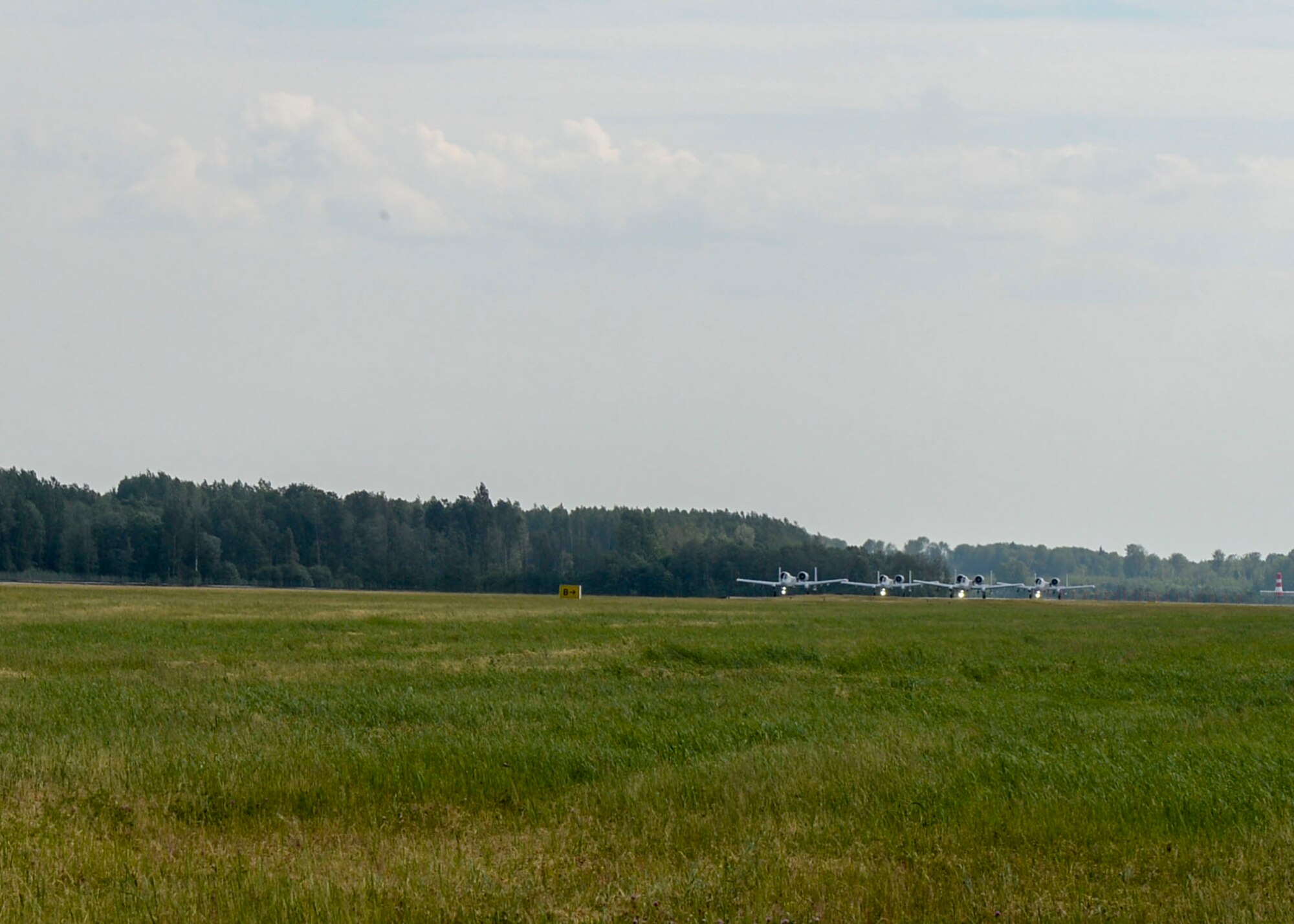 Four A-10 Thunderbolt IIs prepare for takeoff at Lielvarde Air Base, Latvia, June 4, 2018. Eight A-10s were deployed to Lielvarde AB to perform close air support maneuvers to improve capabilities with Joint Terminal Attack Controllers. (U.S. Air Force photo by Staff Sgt. Jimmie D. Pike)