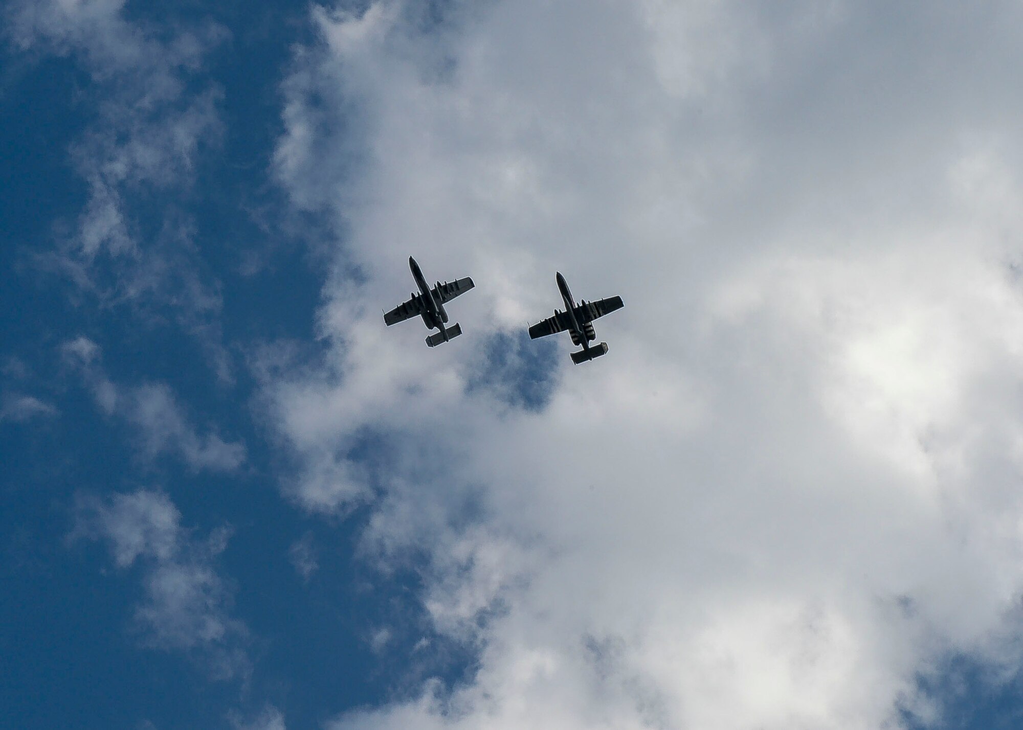 Two A-10 Thunderbolt II aircrafts fly over Lielvarde Air Base, Latvia, June 4, 2018. A-10s were deployed to Europe from the 127th Wing at Selfridge Air National Guard Base, Michigan, to support exercise Saber Strike 18. While flying, A-10 pilots worked on close air support tactics and communication with Joint Terminal Attack Controllers to combine air and land capabilities for U.S. and partnered nations. (U.S. Air Force photo by Staff Sgt. Jimmie D. Pike)