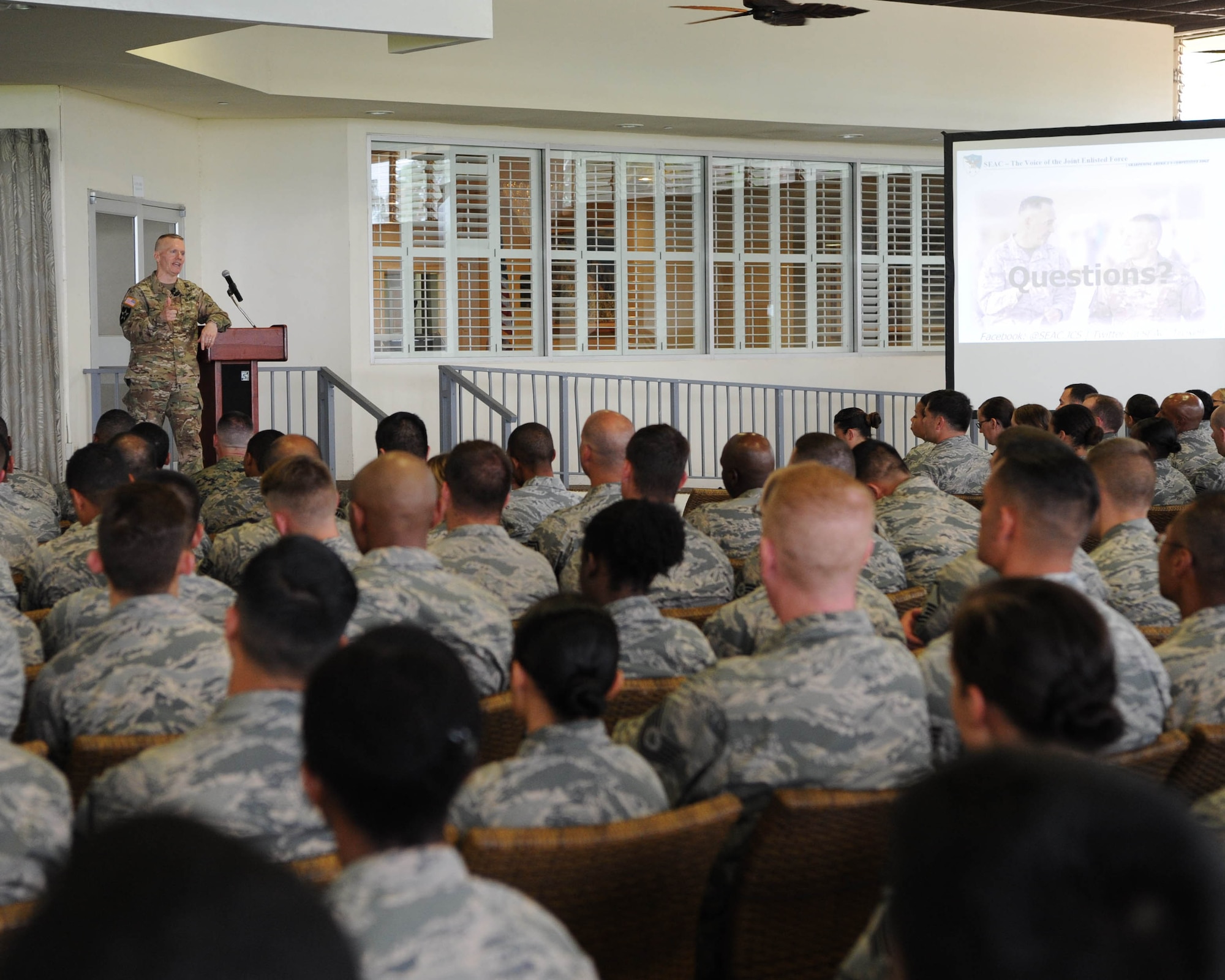 U.S. Army Command Sgt. Maj. John Wayne Troxell, senior enlisted advisor to the chairman of the Joint Chiefs of Staff, takes questions from Airmen during an enlisted all-call at Joint Base Pearl Harbor-Hickam, Hawaii, May 29, 2018. Troxell spent time speaking to Airmen about building relationships with other services and our international partners, total force fitness and the importance of the enlisted force. (U.S. Air Force photo by Master Sgt. Taylor Worley)